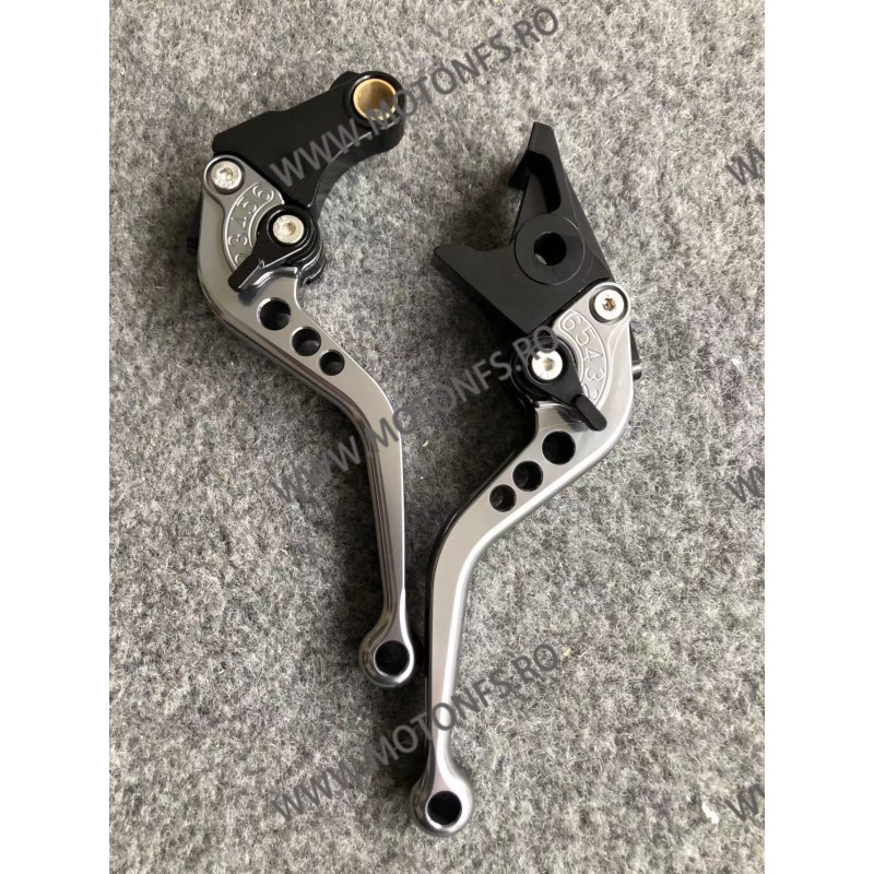 Manete Scurte Ambreiaj Frana 2 Degete Titan Cu Chieta Negre UCBP84 UCBP84  Manete Classic Scurte 2 Degete 150,00 lei 130,00 l...